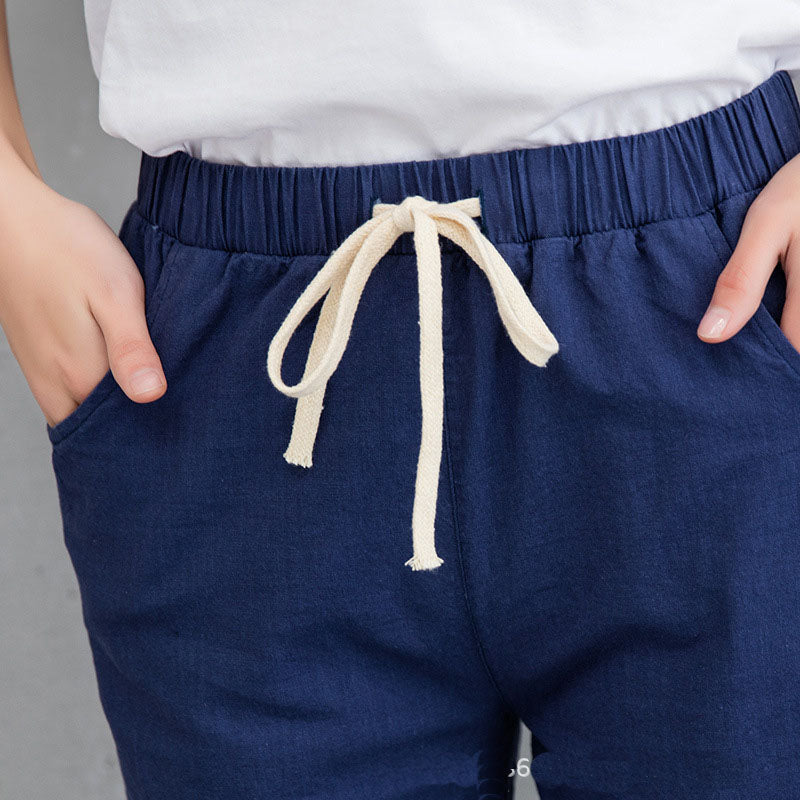 Plátěné kalhoty s bílou tkaničkou